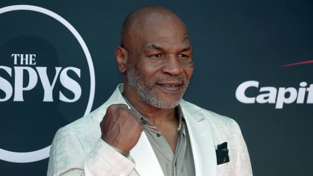Mike Tyson arrives on the red carpet before the 2023 ESPYS at the Dolby Theatre.