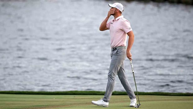 Wyndham Clark reacts after missing a putt on the 18th green during the final round of the 2024 Players Championship at TPC Sawgrass in Ponte Vedra Beach, Fla.